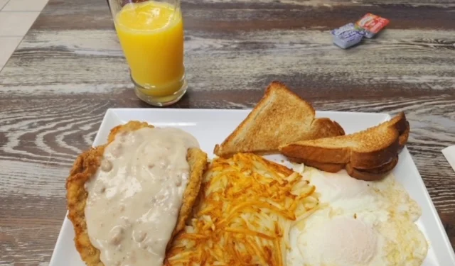 Southern chicken fried steak with gravy and eggs
