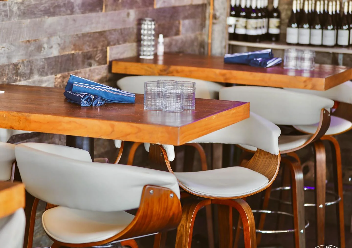 Stylish restaurant interior with wooden tables and modern seating