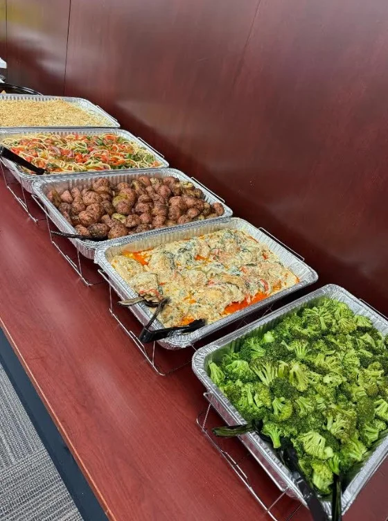 Catering setup with a variety of delicious food options.
