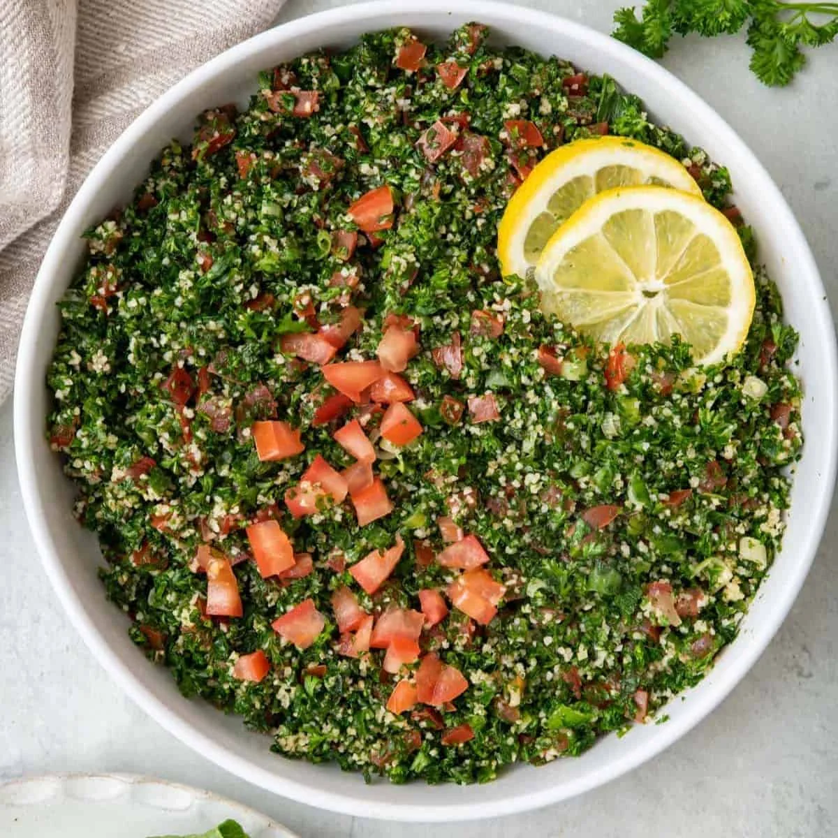 Fresh tabbouleh salad with parsley and tomatoes