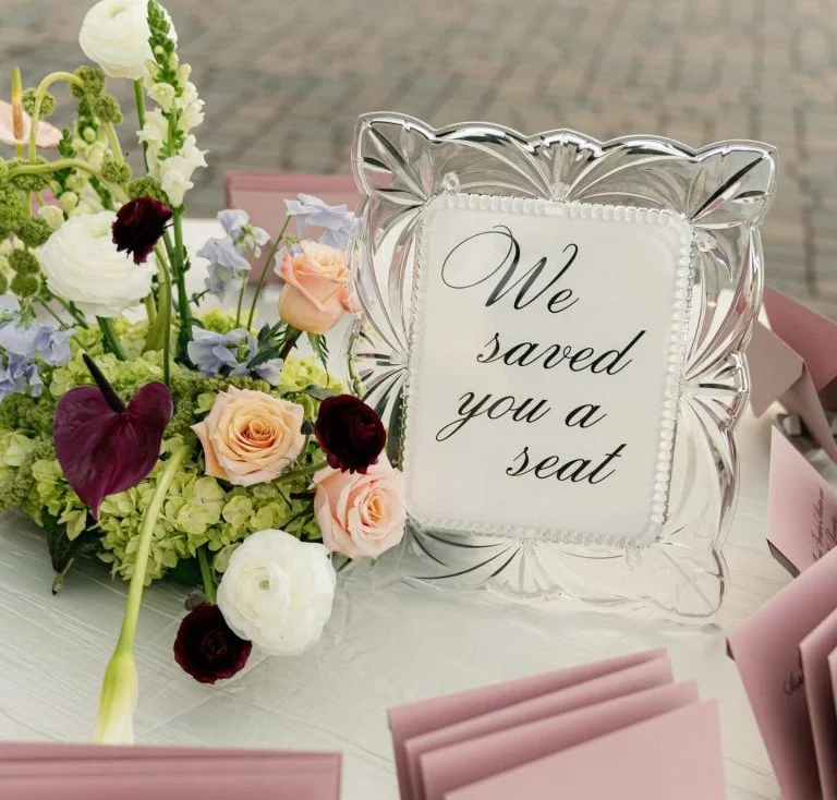 Elegant wedding seating display with floral arrangements