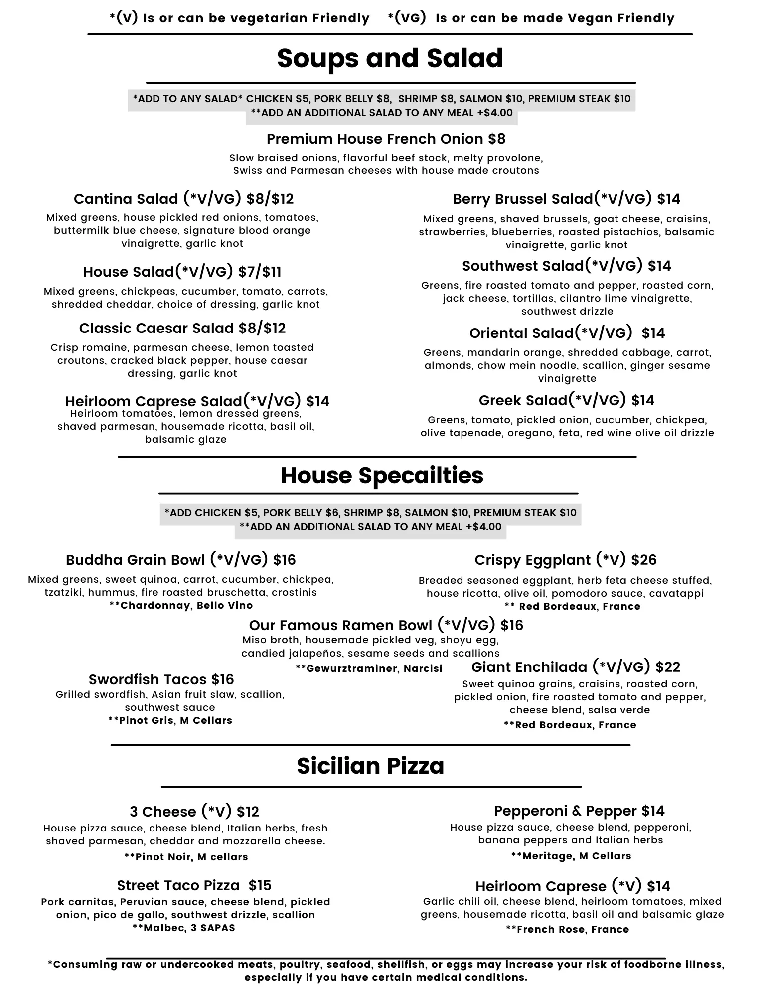 Variety of fresh salads and Sicilian pizzas in a vibrant restaurant setting