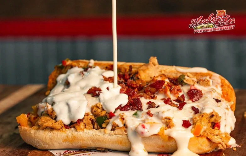 Loaded chicken cheesesteak sandwich with creamy sauce