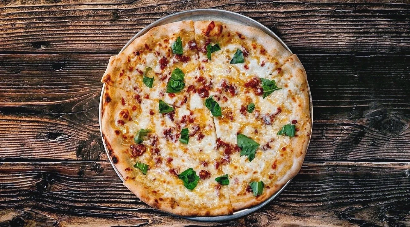 Delicious Margherita pizza topped with fresh basil