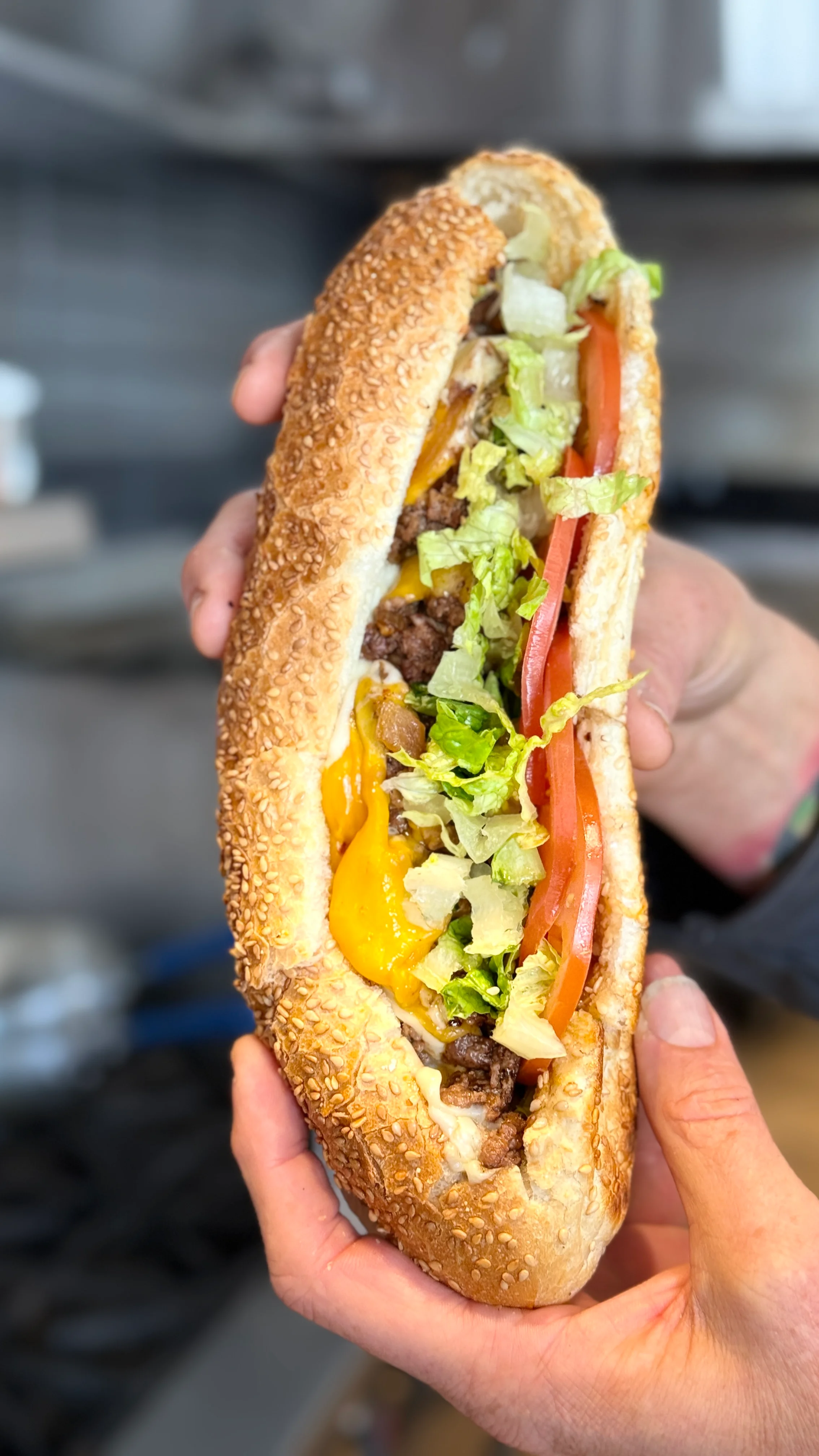 Loaded cheesesteak sandwich with fresh toppings
