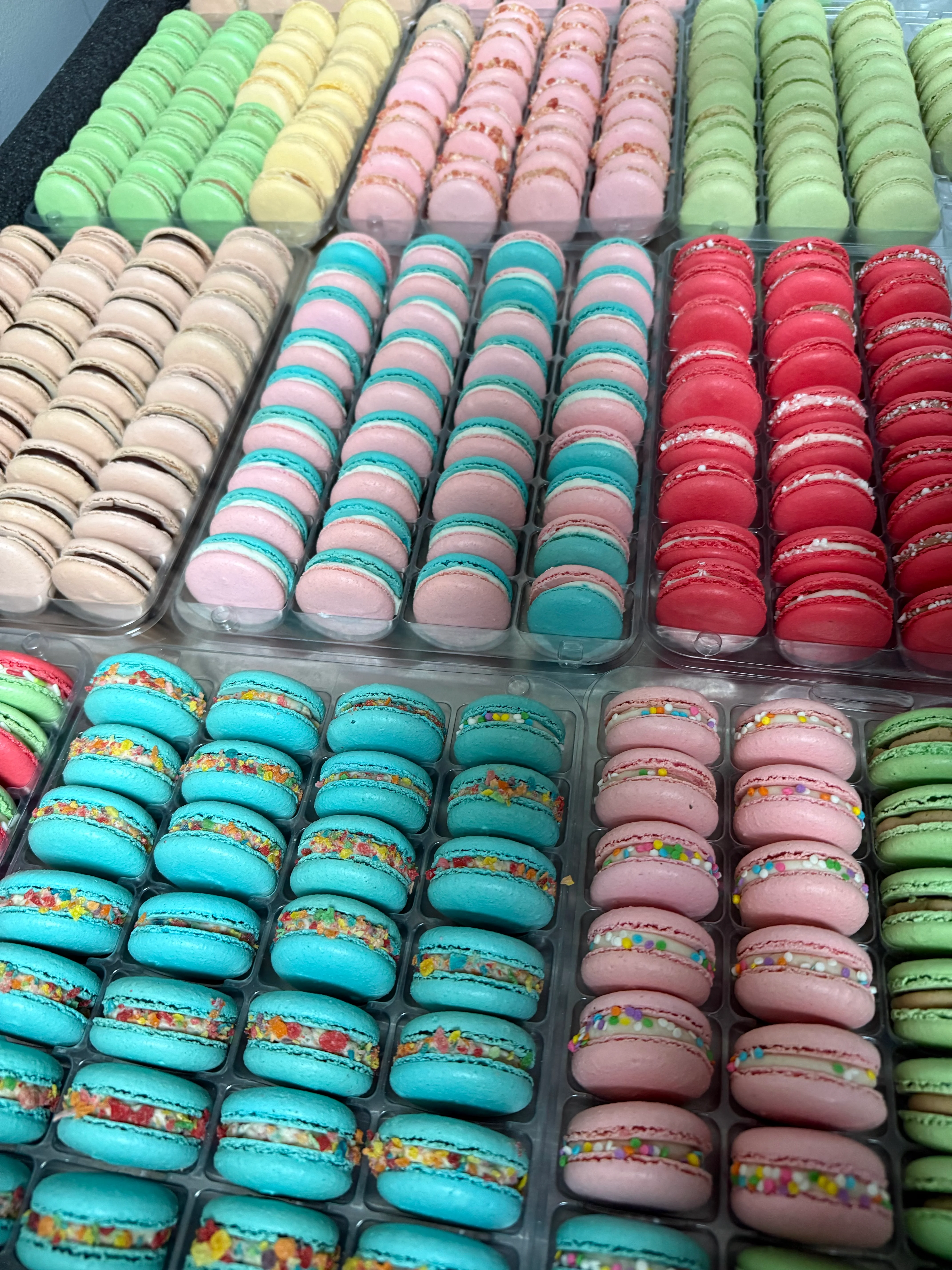 Colorful assortment of French macarons in various flavors