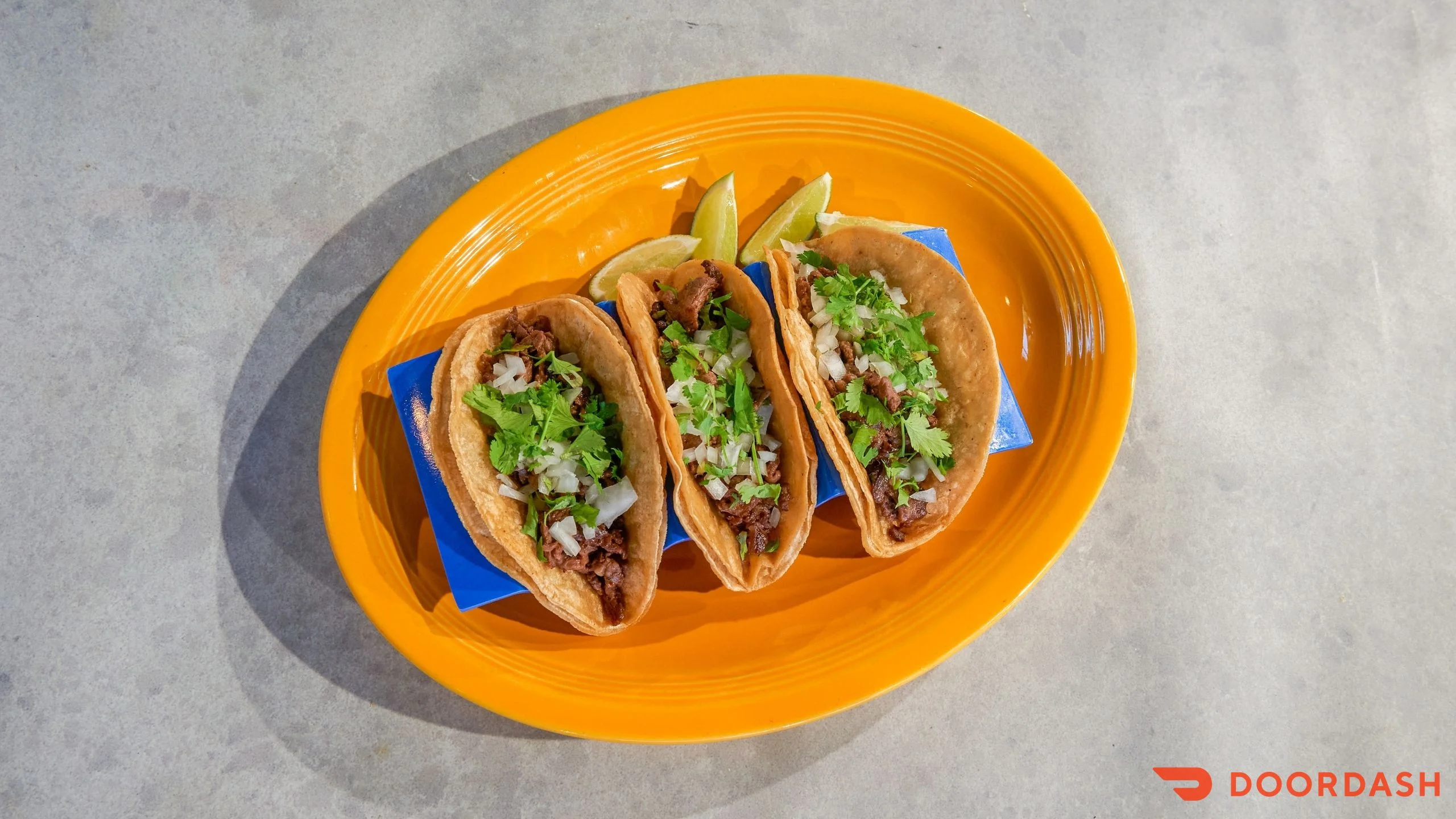 Authentic Mexican street tacos with cilantro and onions