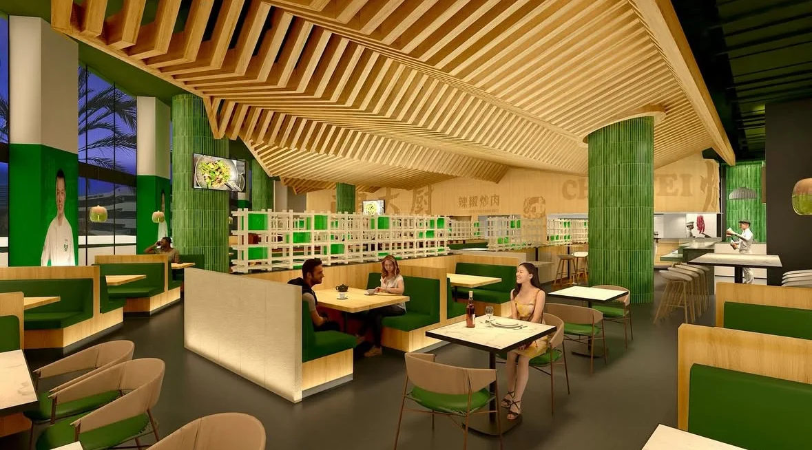 Modern restaurant interior with green accents and wooden decor.