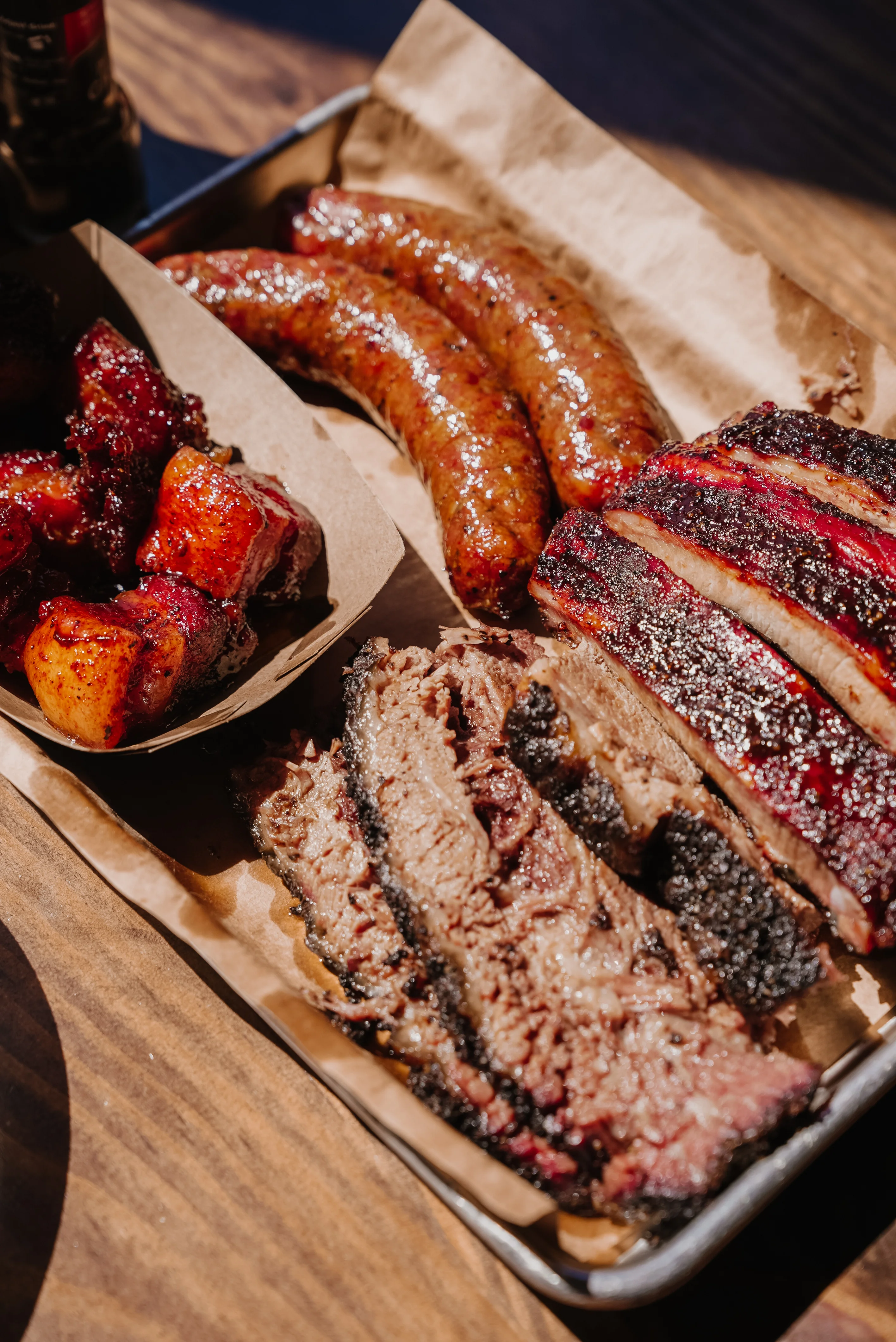 Texas-style barbecue platter with brisket and sausages