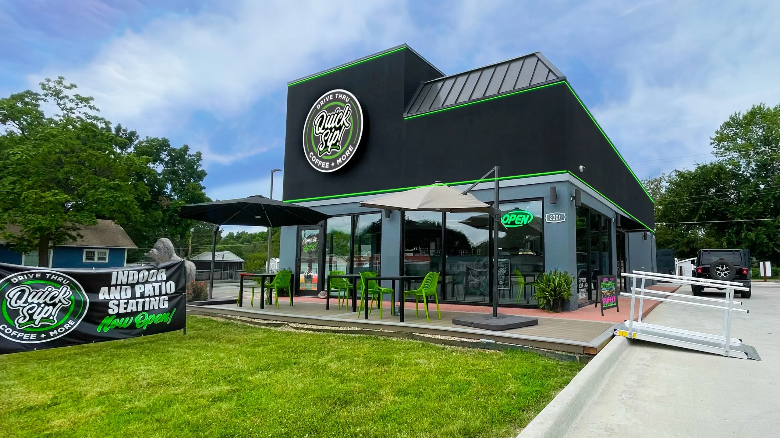 Modern coffee shop exterior with patio seating