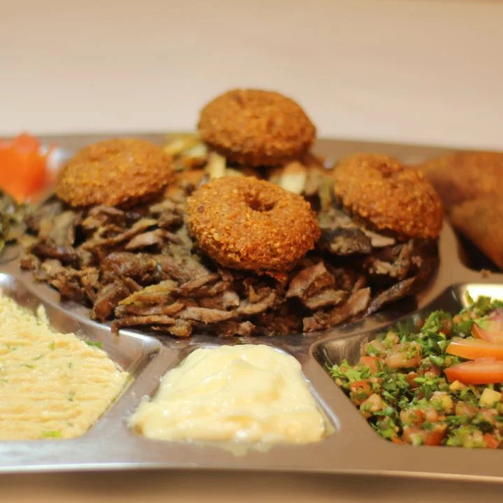 Middle Eastern mixed grill platter with falafel and hummus