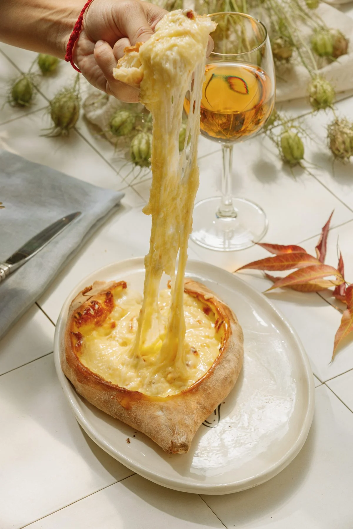 Cheese pulling from a khachapuri