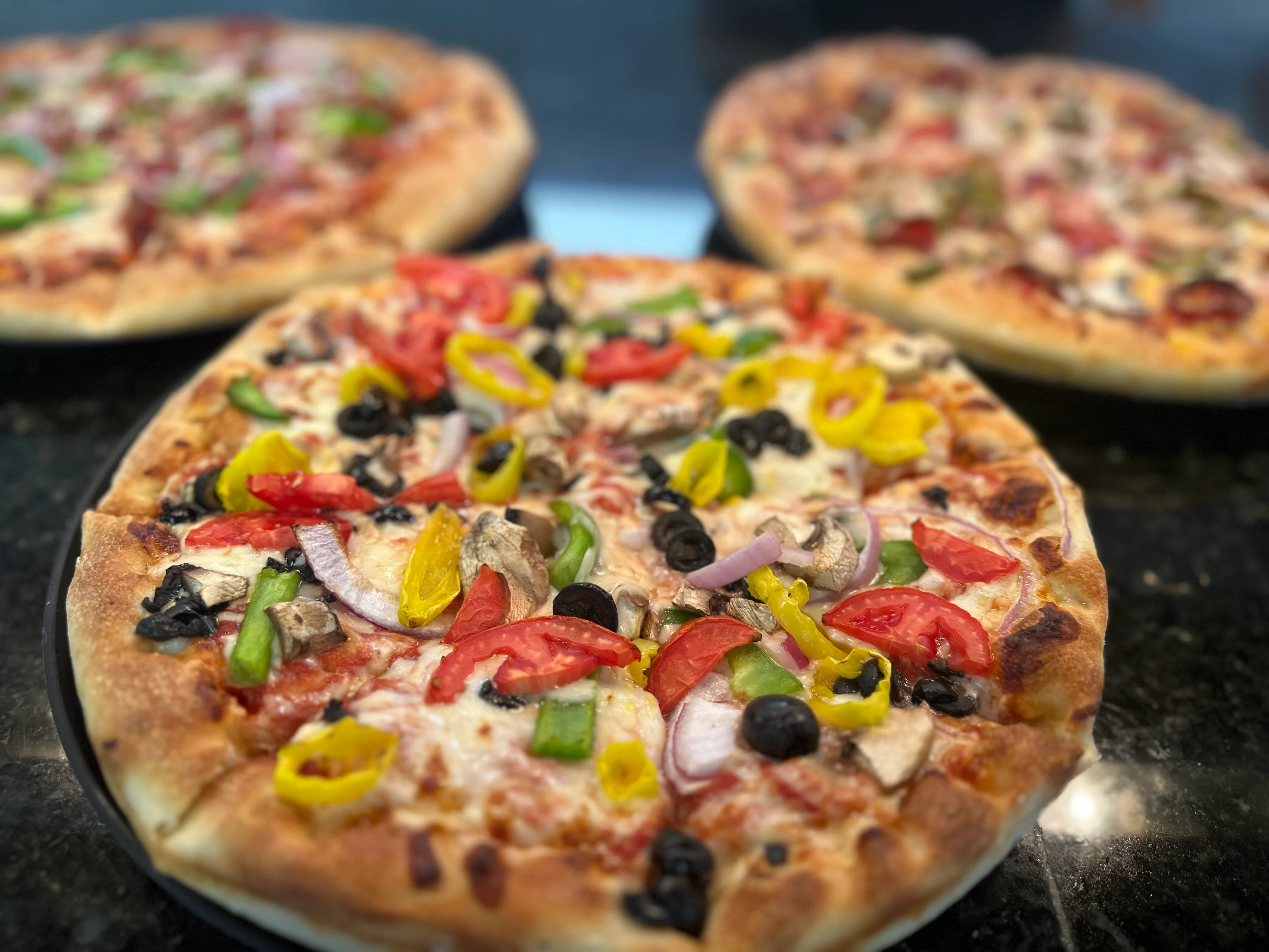 Colorful vegetarian pizza with fresh toppings