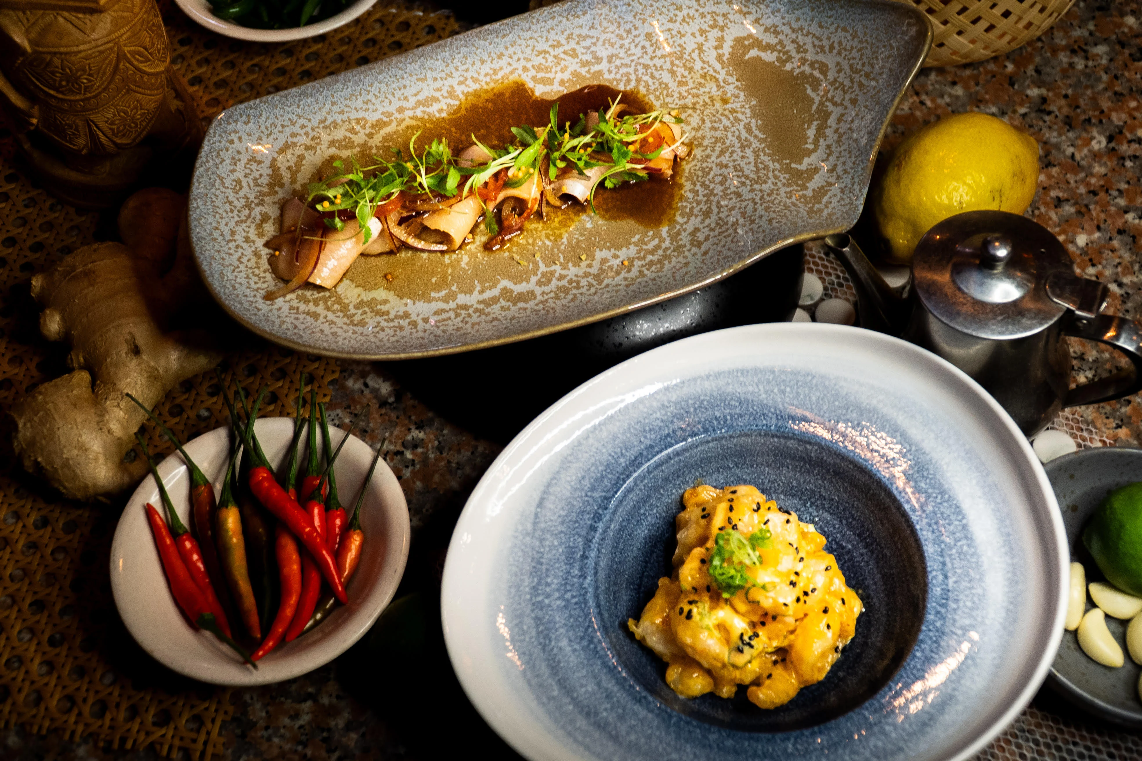 Asian-inspired seafood dish with vibrant garnishes