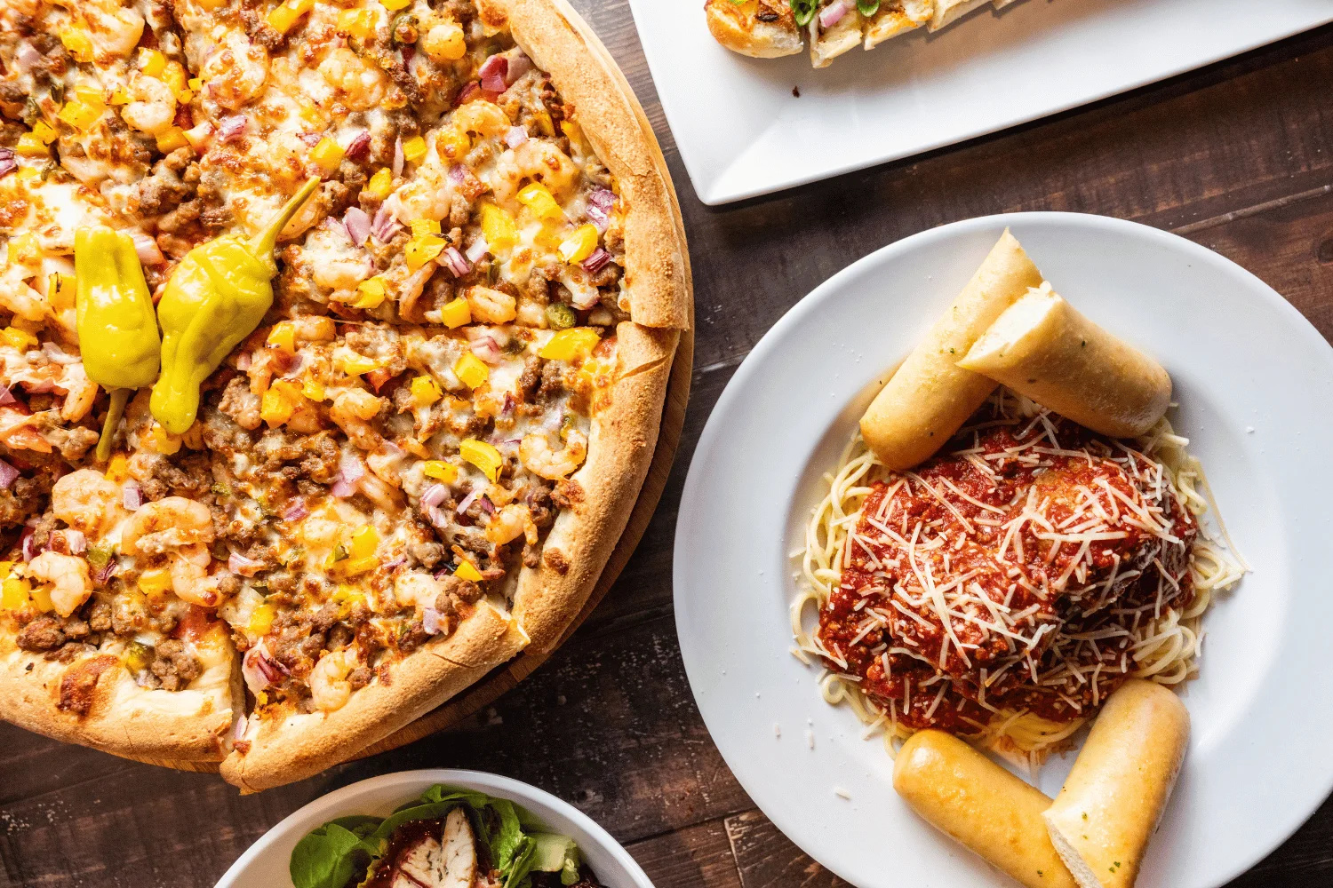 Delicious shrimp pizza topped with yellow peppers.