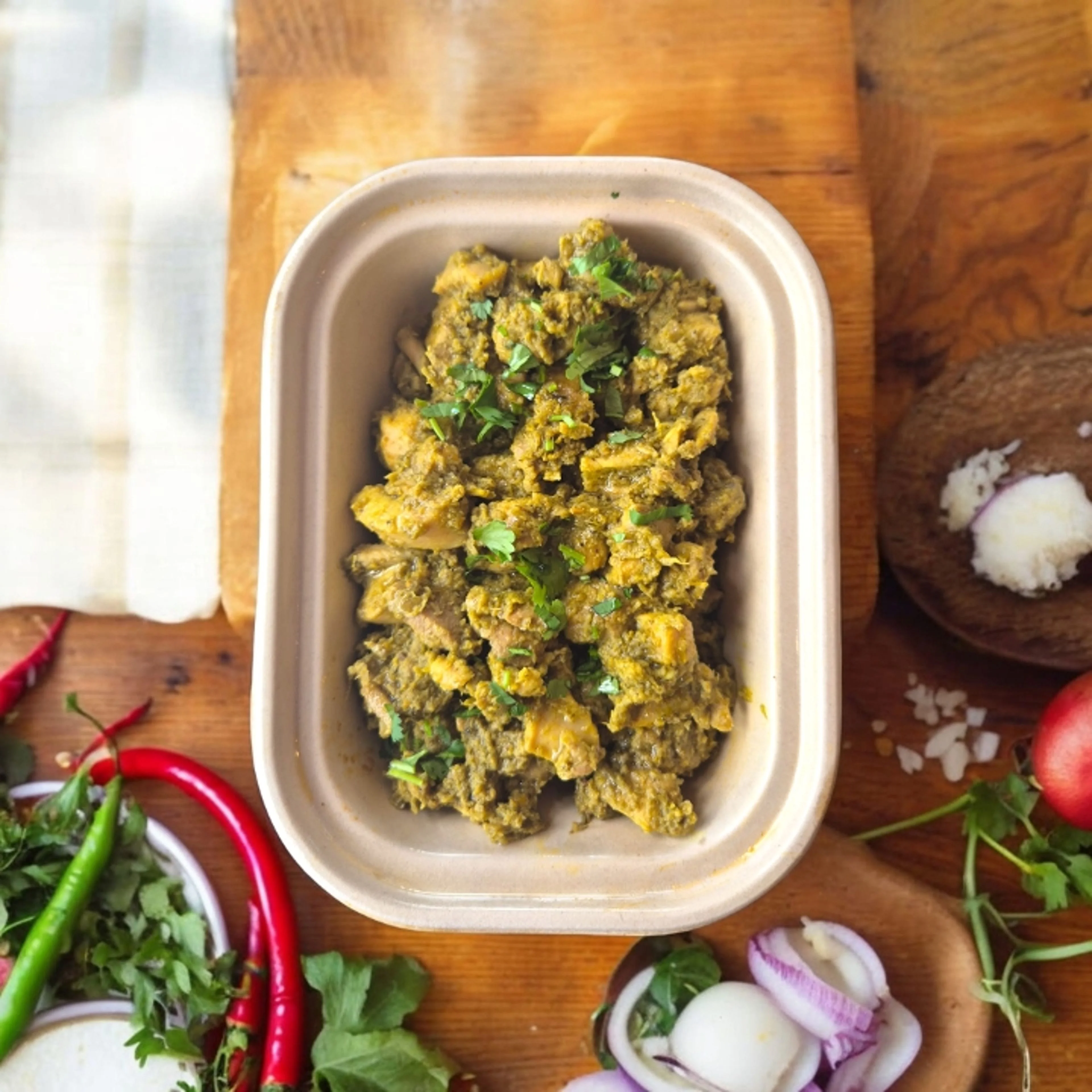 Flavorful Indian saag chicken with fresh herbs