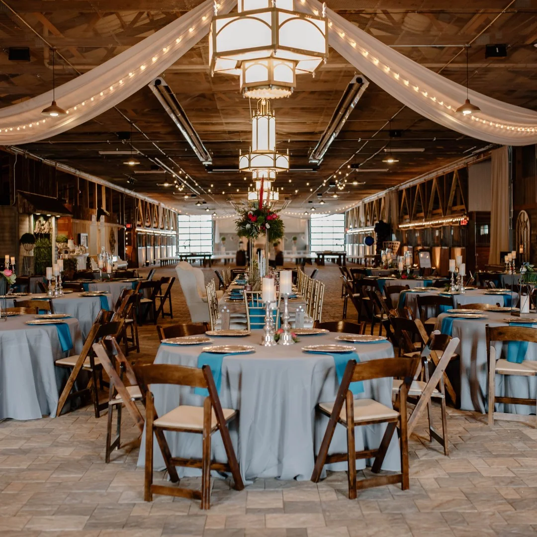 Barn Wedding catering setup with food and drinks at an outdoor event.