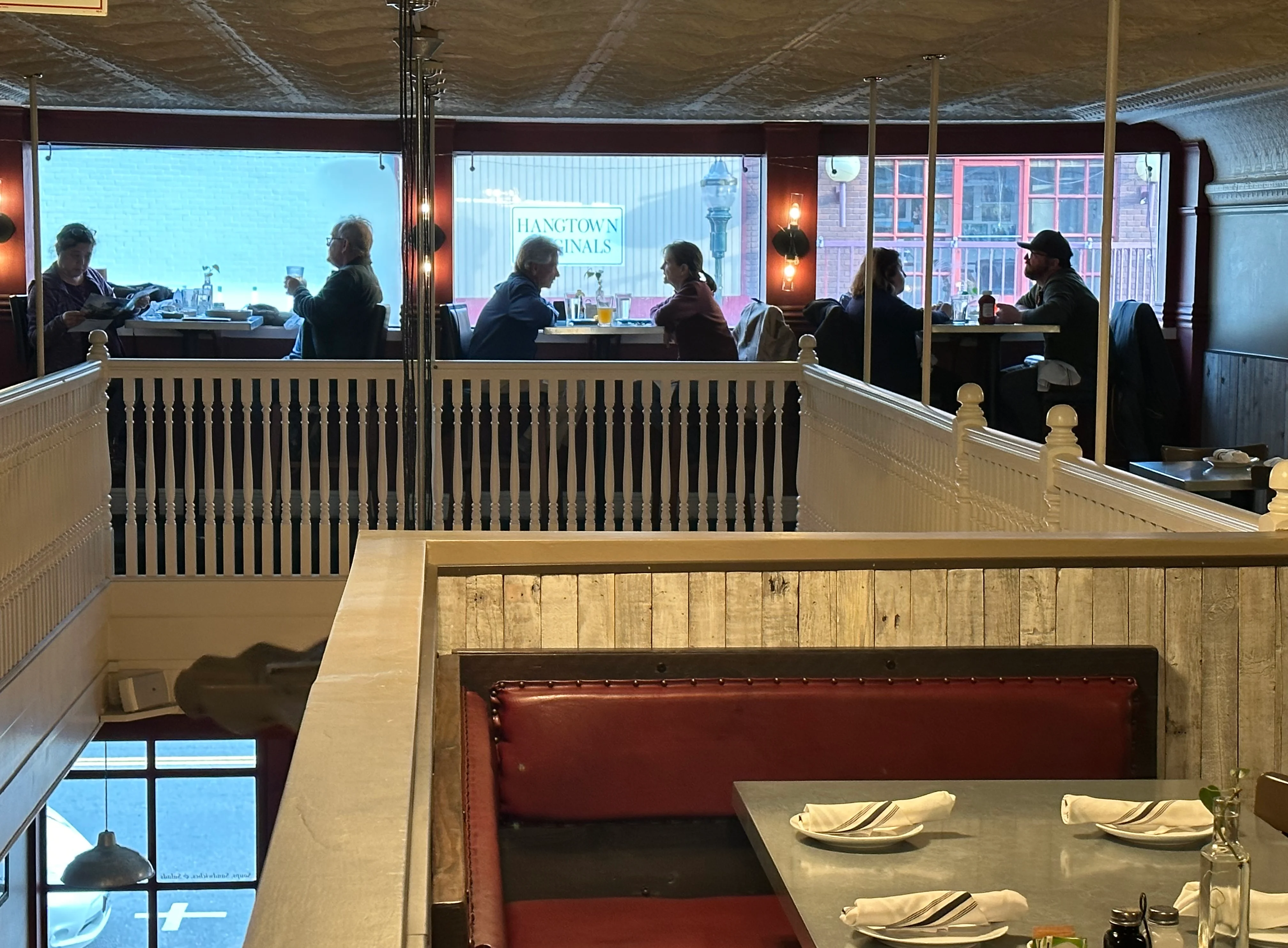Cozy restaurant interior with diners enjoying meals