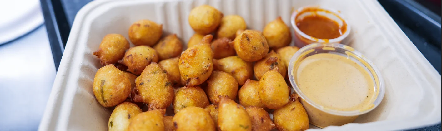Crispy Indian medu vada served with chutneys