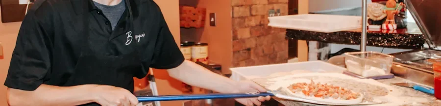 A restaurant chef preparing a dish