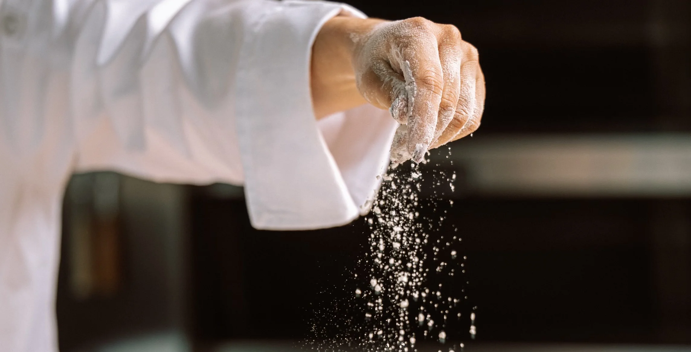 A restaurant chef preparing a dish