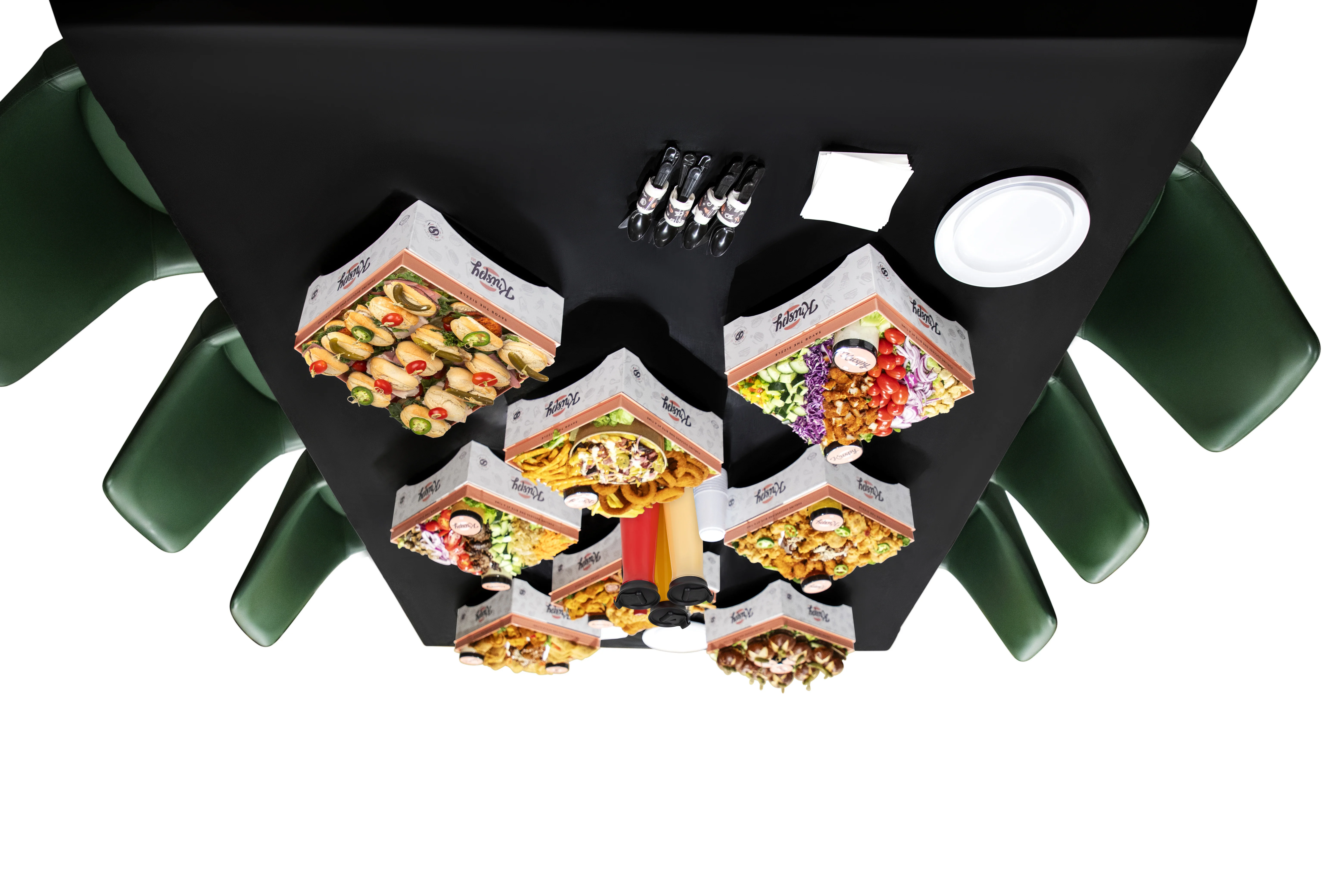 Assorted party platters featuring American appetizers and snacks on a table