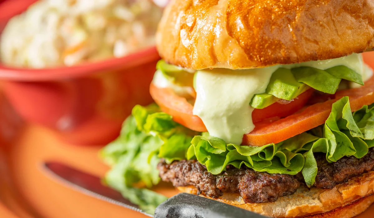 Juicy American cheeseburger with fresh toppings