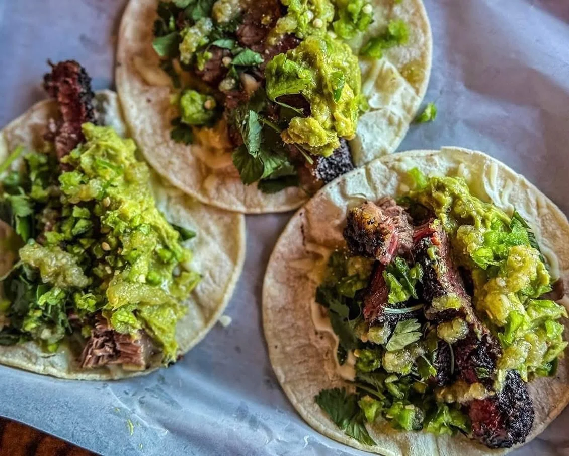 Authentic Mexican street tacos with beef and salsa verde