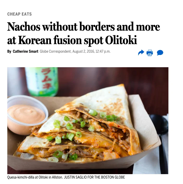 Korean quesadilla with kimchi and beef served in a takeout box