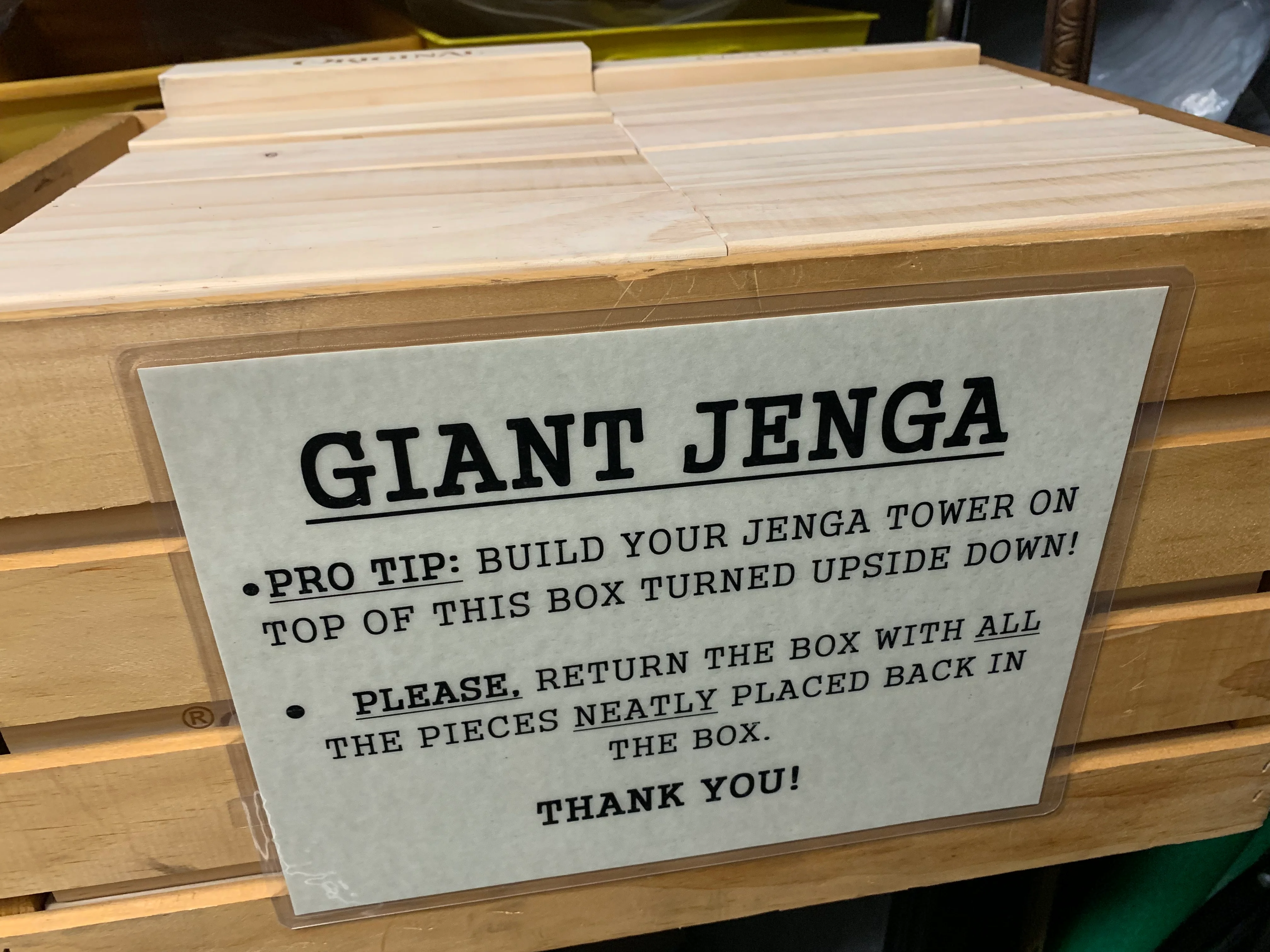 Giant Jenga game setup with instructions