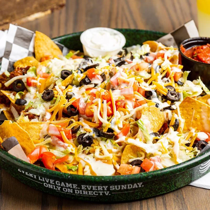 Loaded nachos with cheese and toppings