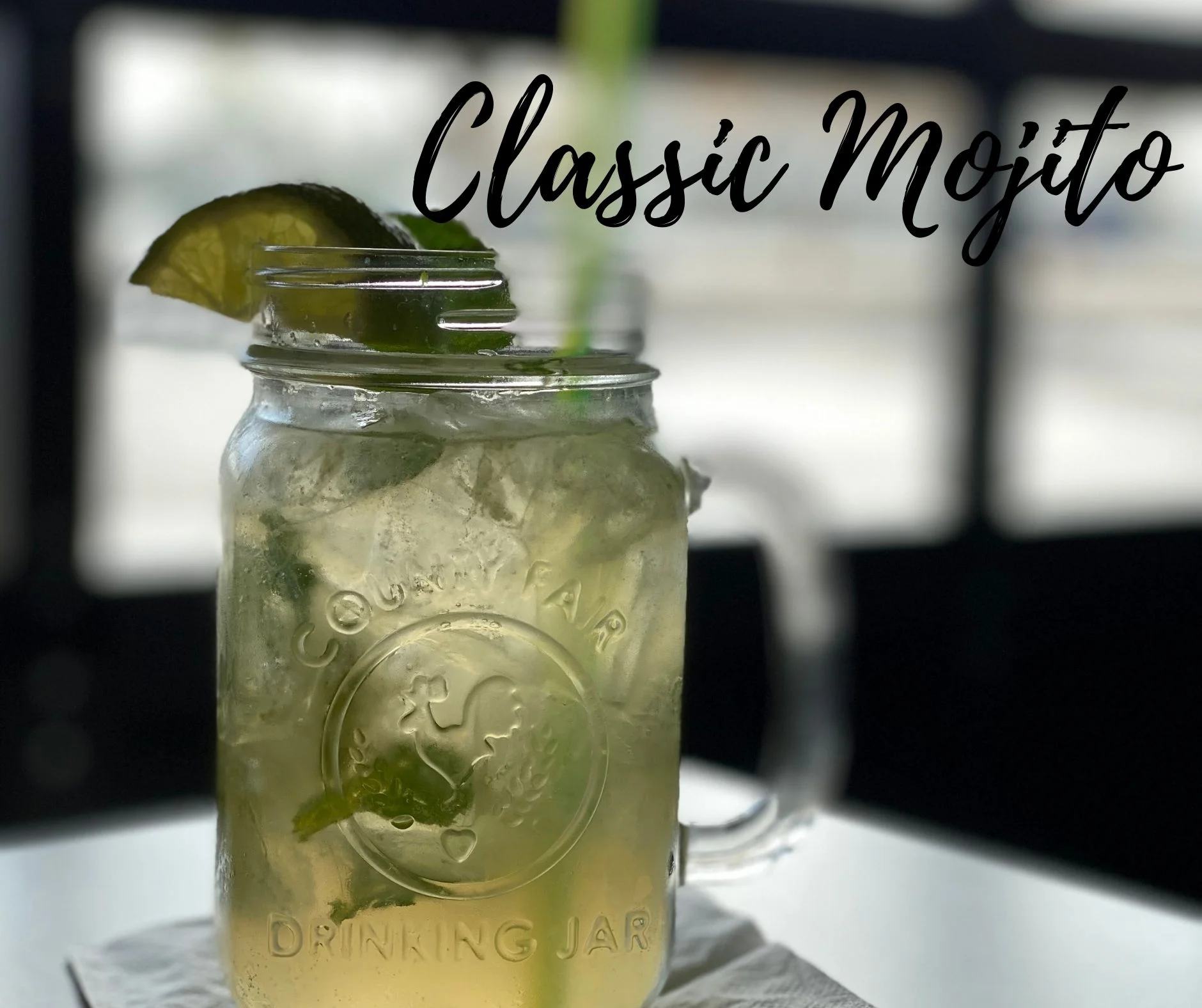 A refreshing classic mojito cocktail with mint and lime.