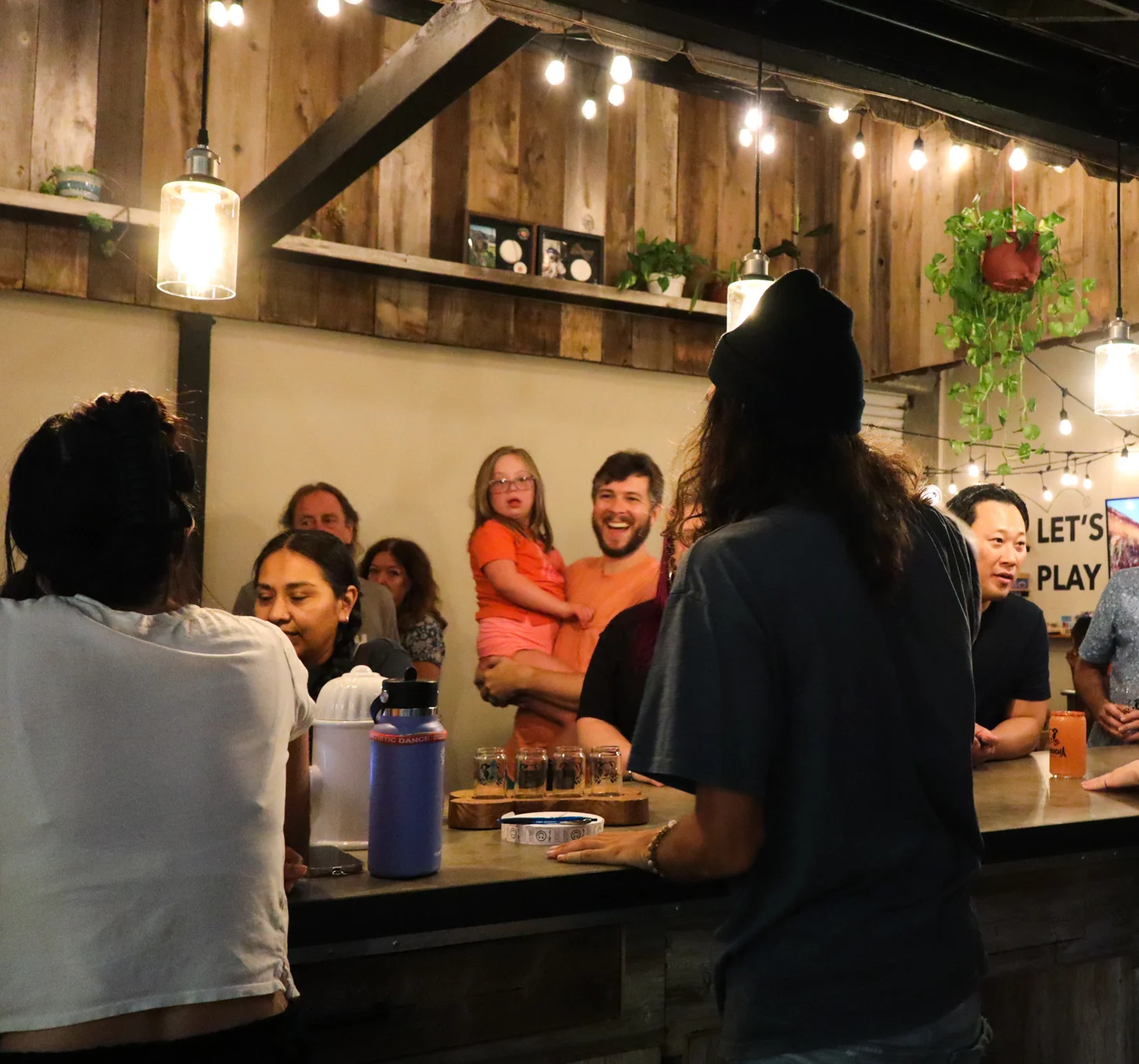 Delicious gourmet burger with fresh toppings on a wooden table