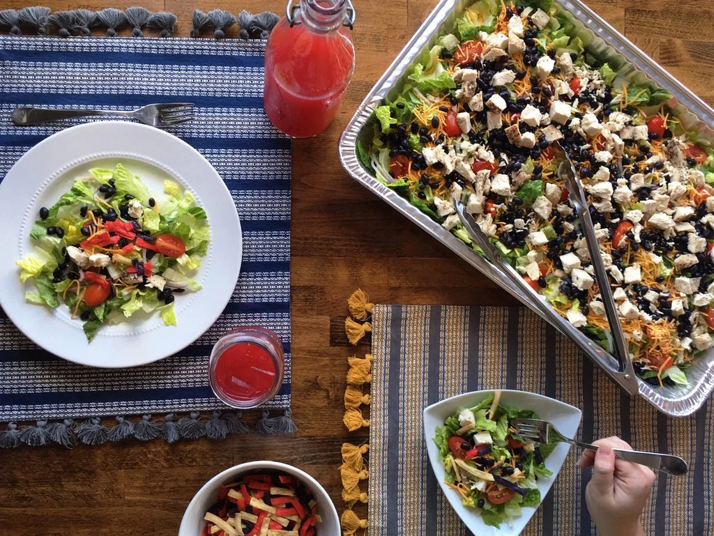 Fresh strawberry salad with mixed greens