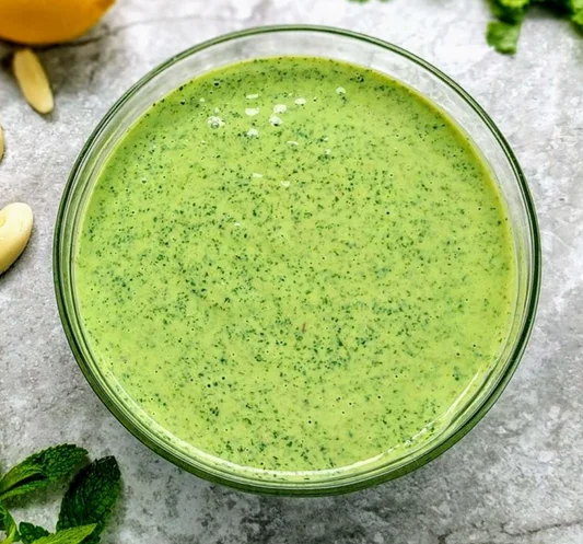 Fresh green mint chutney in a bowl