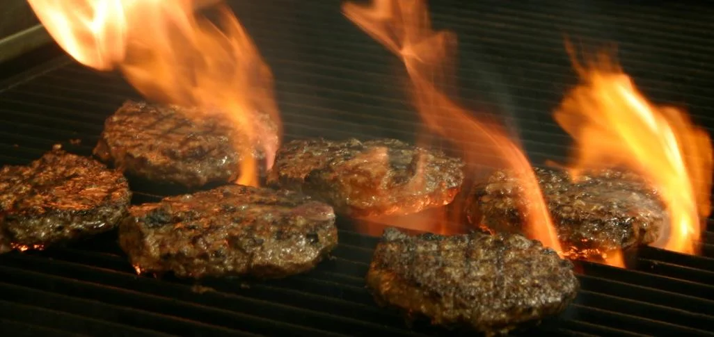 Flame broiling burgers 
