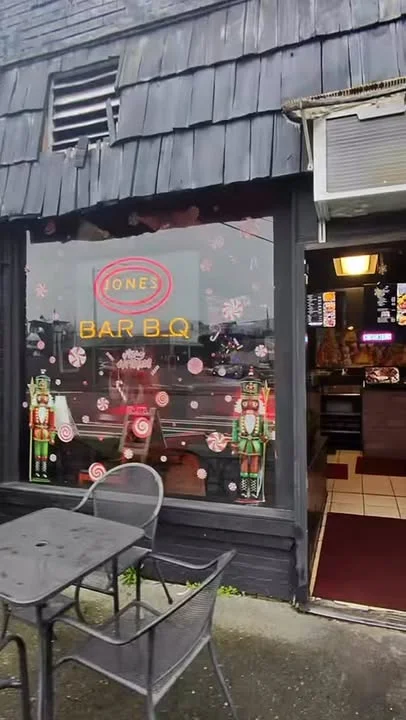 Exterior view of a barbecue restaurant with festive decorations