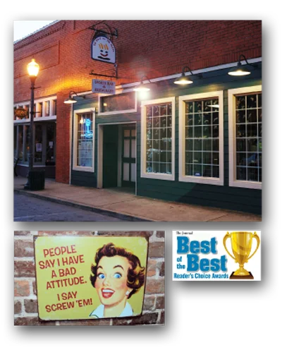 Charming restaurant exterior with vintage signage and award recognition