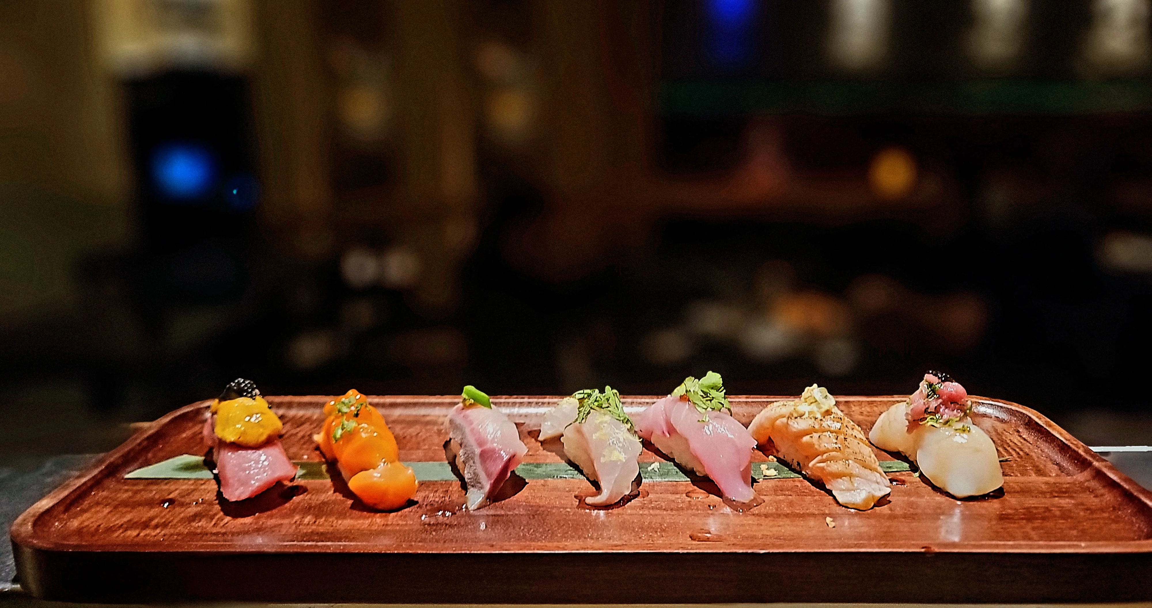 Artisan sushi platter featuring assorted nigiri