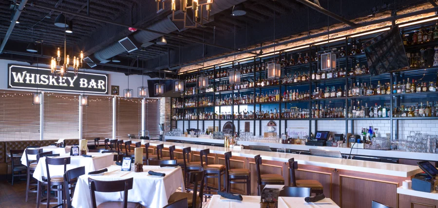 Stylish whiskey bar interior with elegant seating