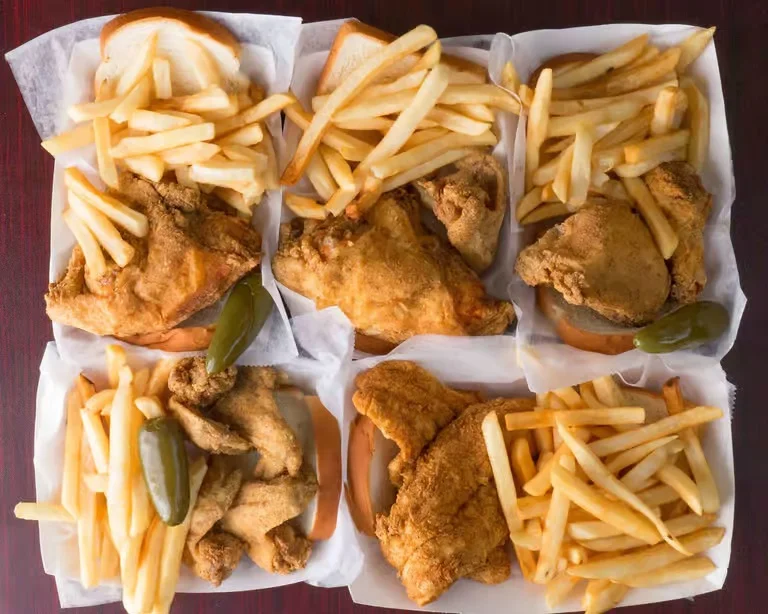 Southern fried chicken with fries and pickles