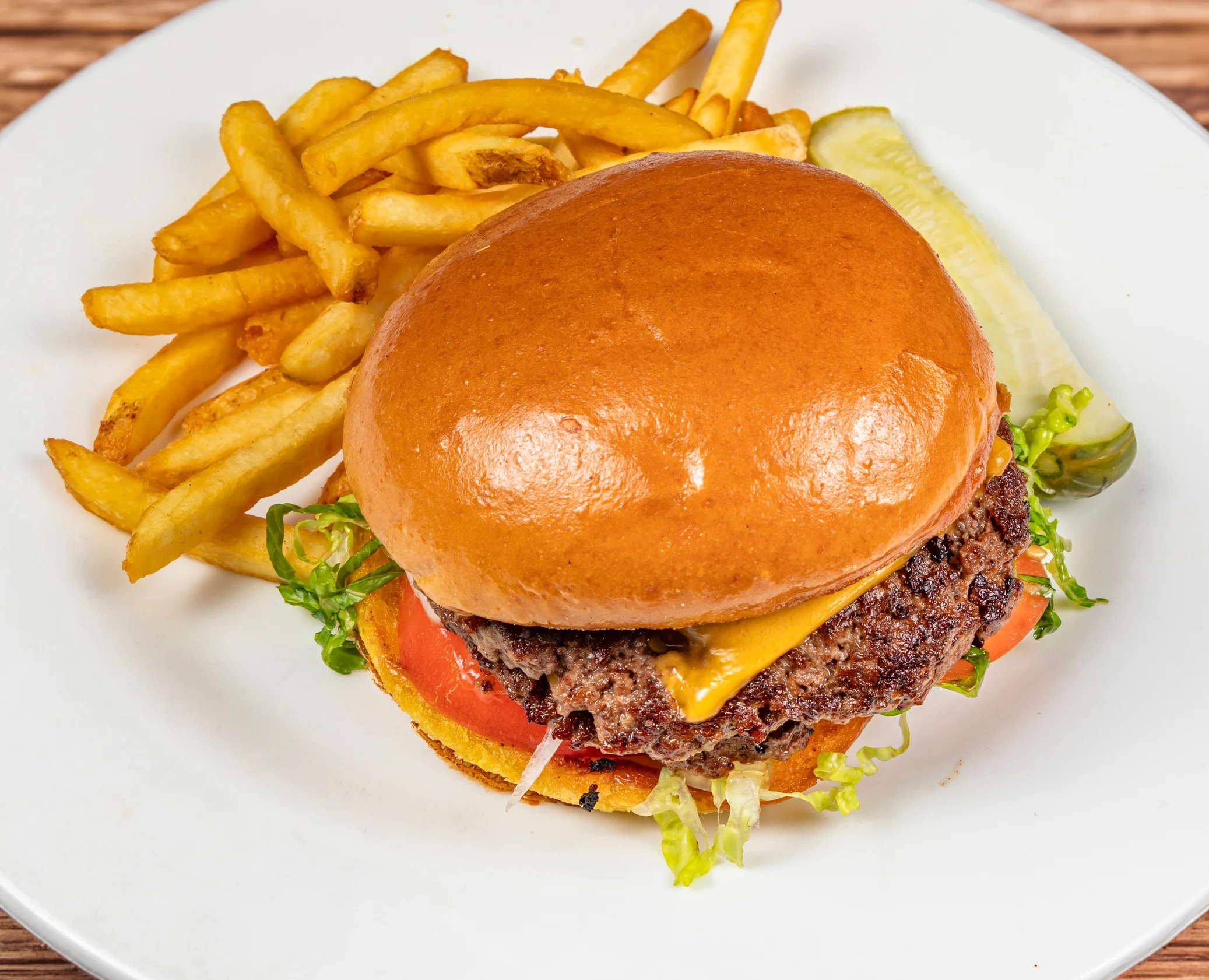 Classic American cheeseburger with fries