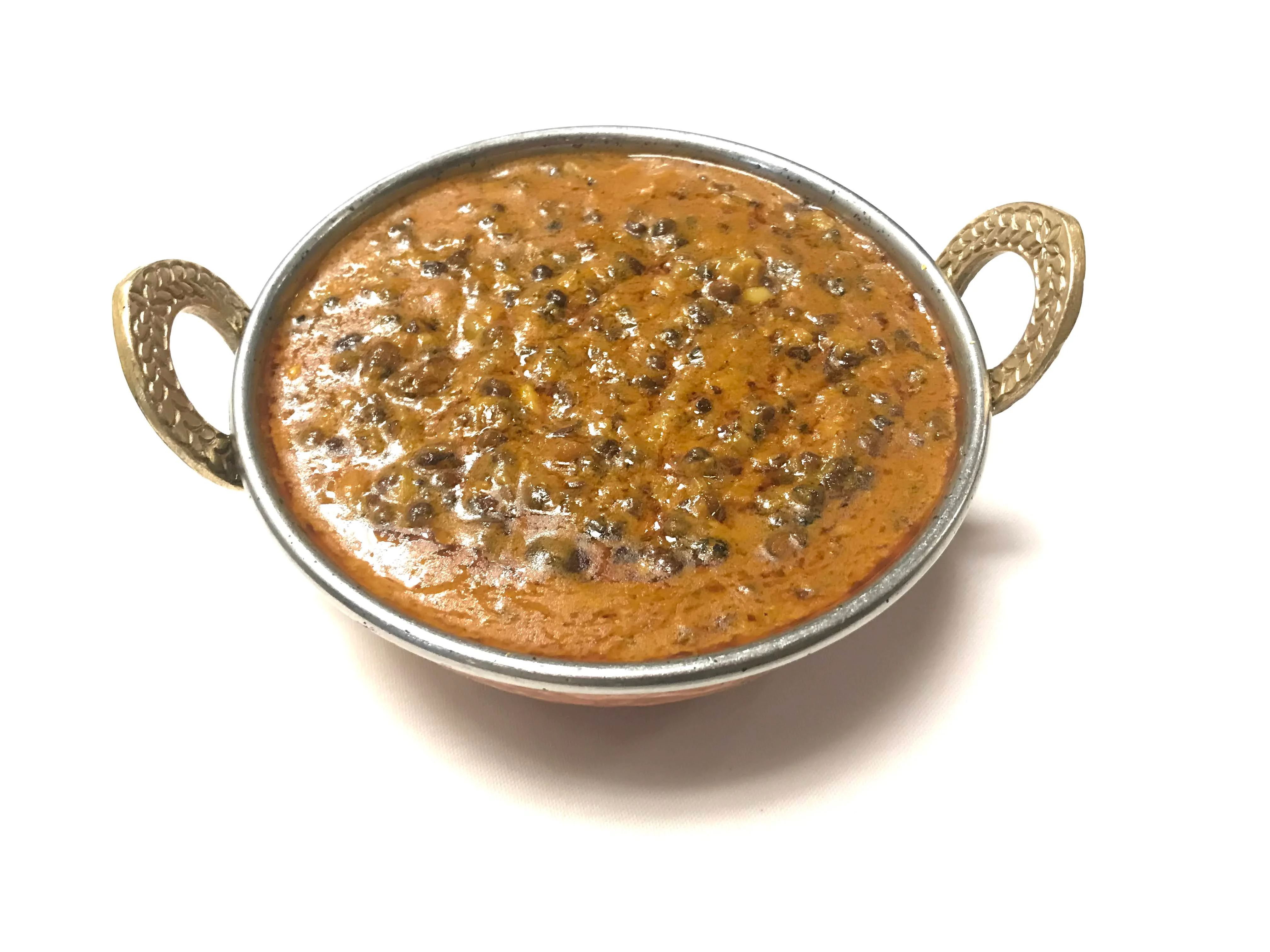 Creamy Indian dal makhani in a traditional serving bowl