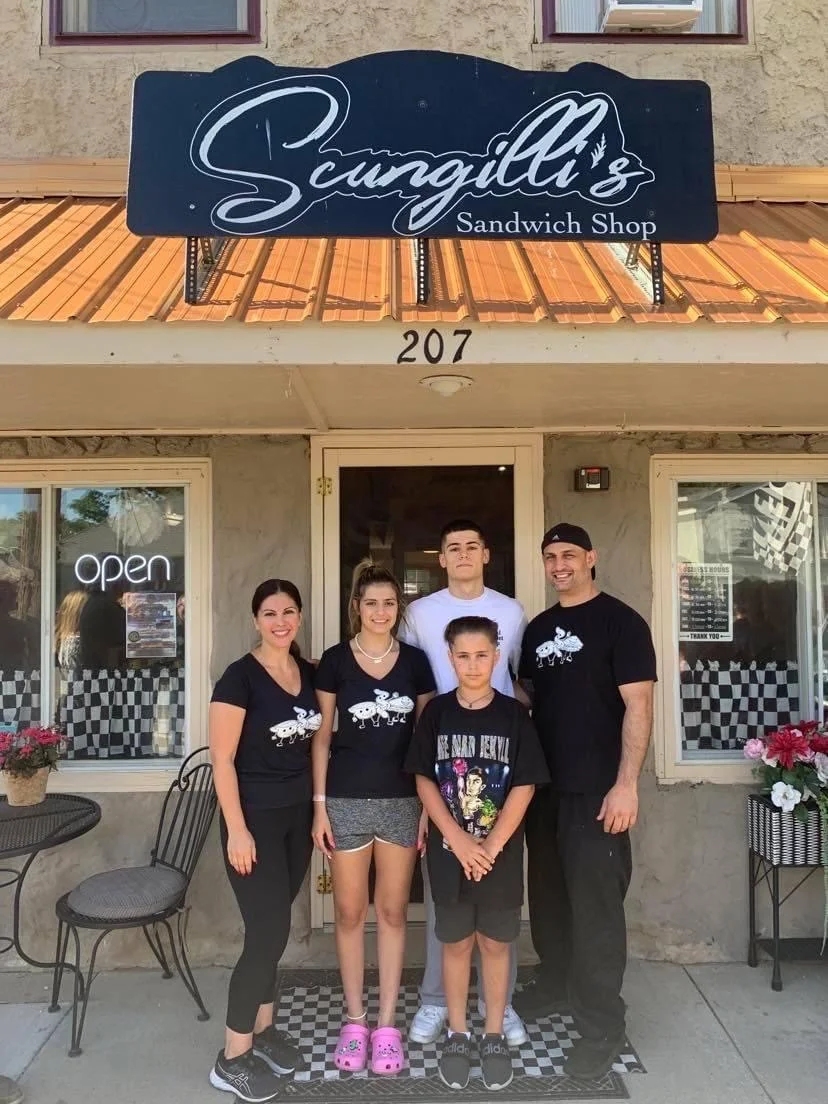 Family in front of Scungilli's Sandwich Shop