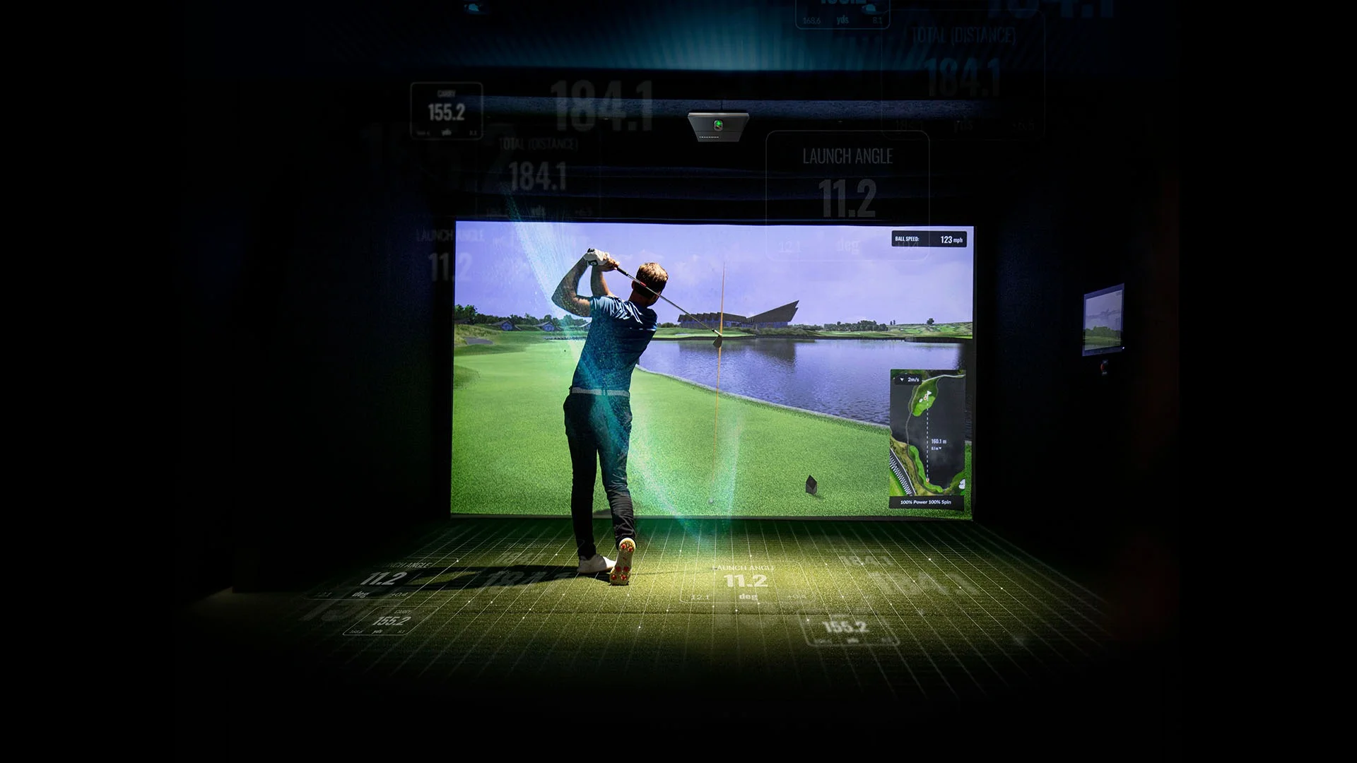 Golfer using a simulator to analyze swing data