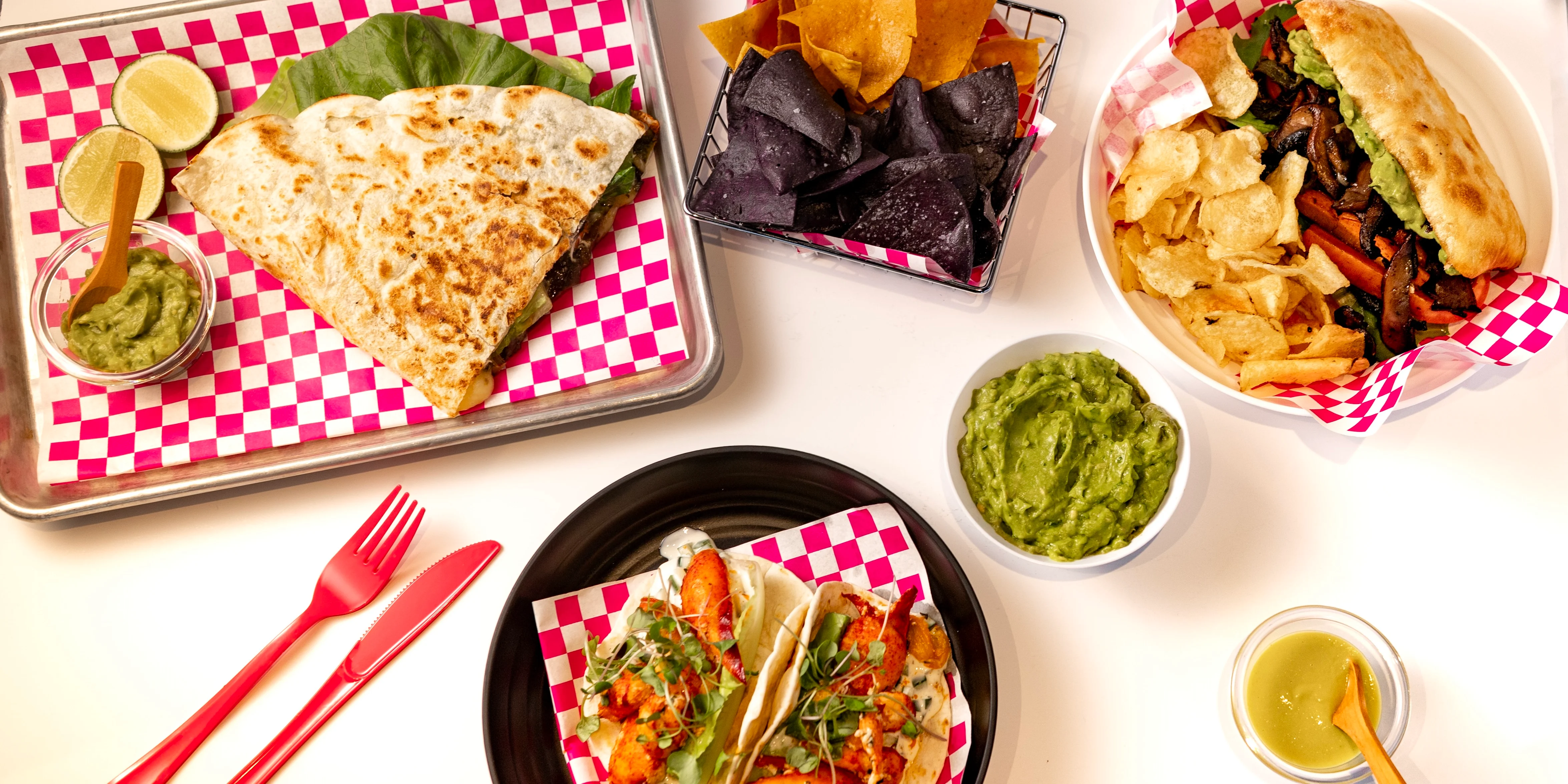 Delicious Mexican tacos with guacamole and quesadilla