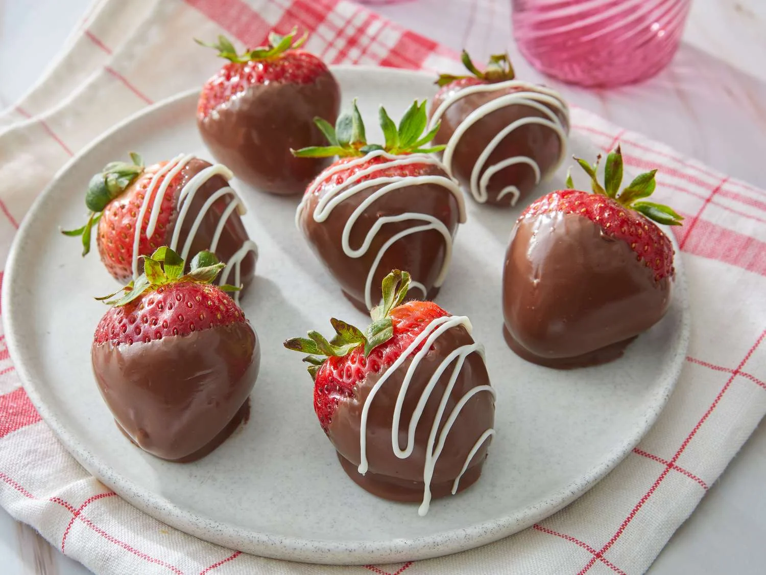 Chocolate-covered strawberries on a plate