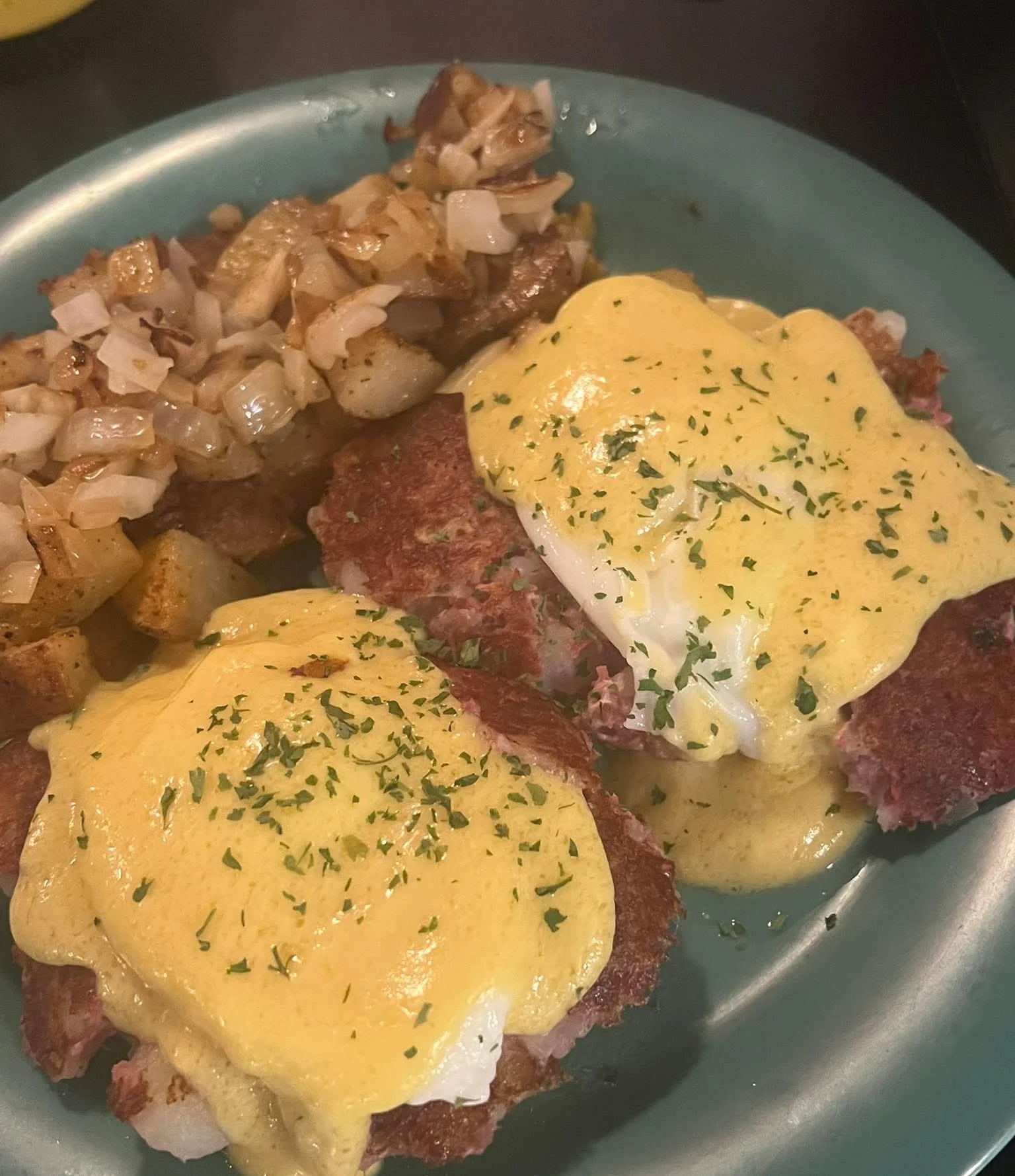 Corned beef hash eggs benedict with hollandaise sauce
