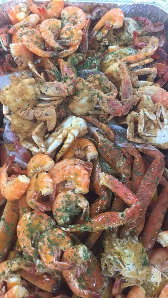 Seafood boil featuring shrimp and crab with spices