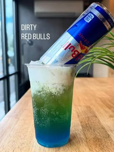 Colorful Dirty Red Bull cocktail with vibrant layers